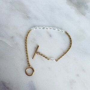 Elegant Gold and White Bracelet